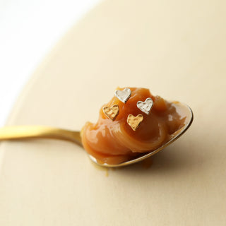 Gold heart stud earrings