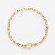 Carrie Elizabeth Albert Gold chain bracelet on a white background