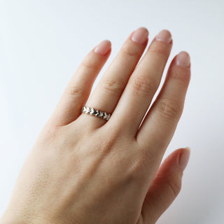 Silver heart motif ring