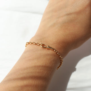 Carrie Elizabeth Gold Albert Chain with Dogclip on a wrist 