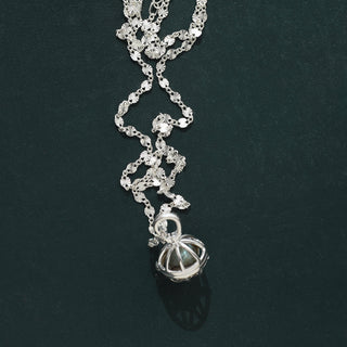 Silver manifestation pendant
