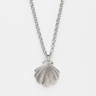 Close-up of the Luxe Shell Pendant Necklace in sterling silver on a white background