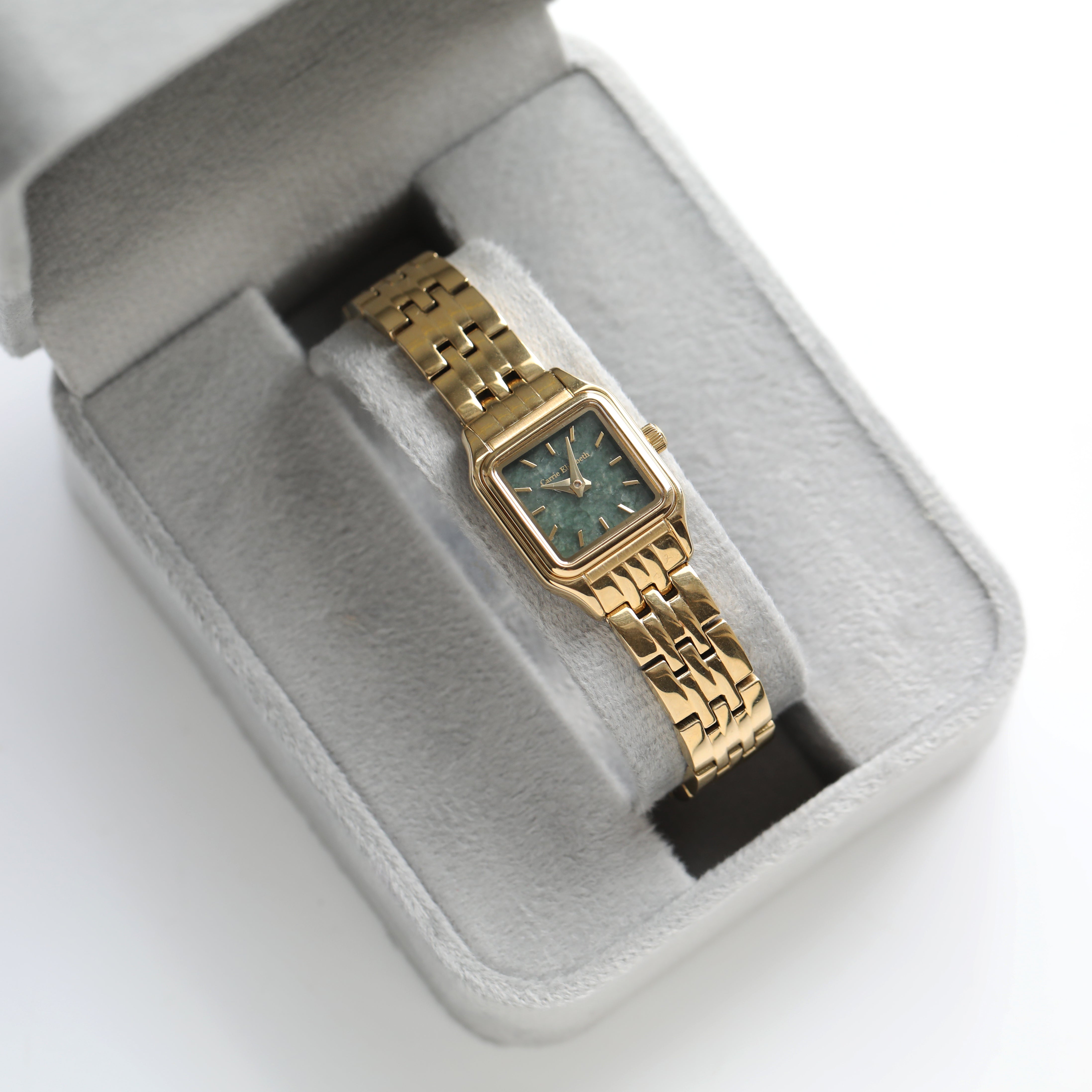Gold watch with labradorite face