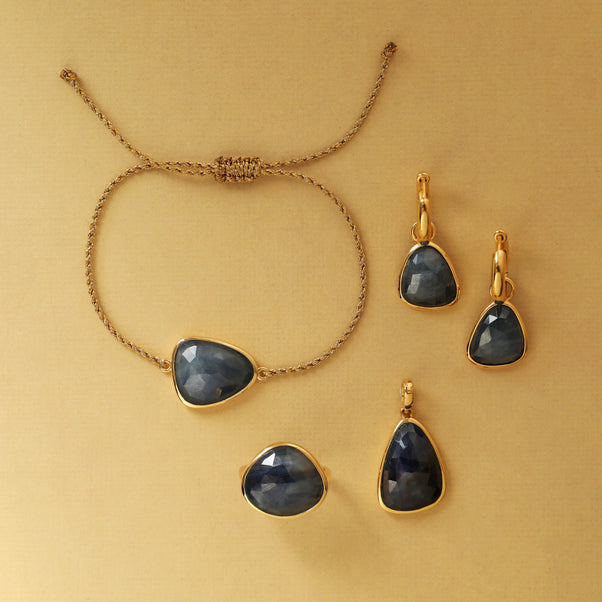 Gold bezel set Sapphire ring