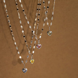 white gold bezel set heart charm on chain