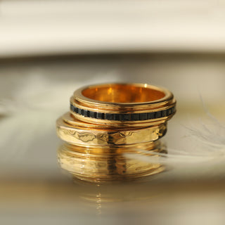 Carrie Elizabeth Black Onyx and molten Spinning Rings