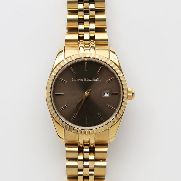 Carrie Elizabeth gold watch with chocolate face, and date dial 