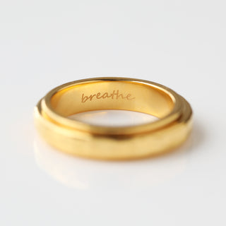 Carrie Elizabeth Your safe space molten spinning ring with breathe engraved on inside band