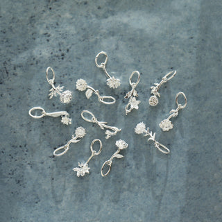silver flower charm