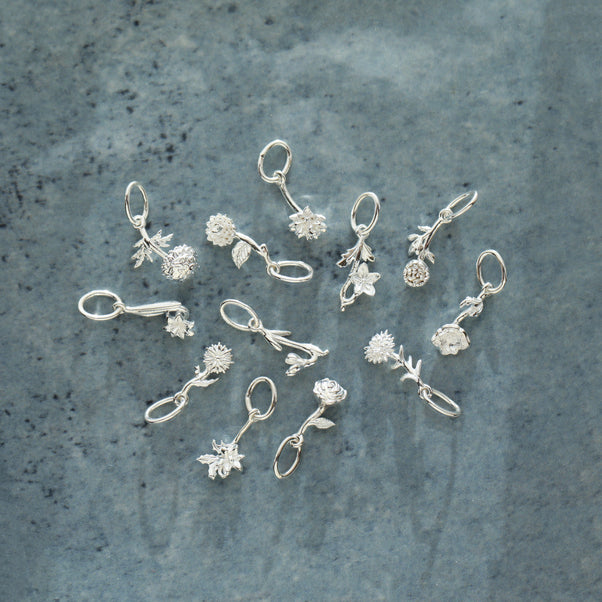 silver flower charm