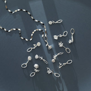 carrie elizabeth silver flower charm