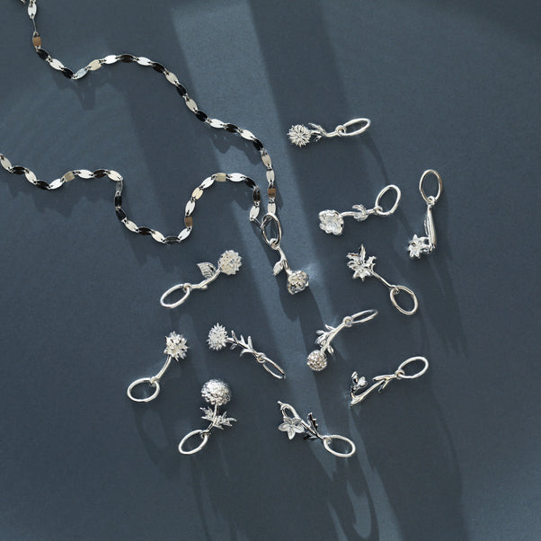 carrie elizabeth silver flower charm