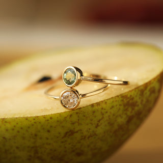 solid gold bezel set sapphire ring