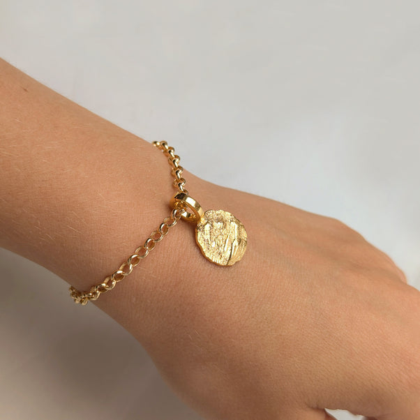 Carrie Elizabeth albert bracelet with molten coin charm