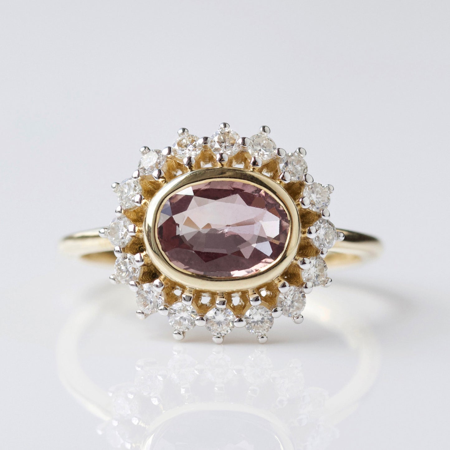 pink sapphire and diamond engagement ring in solid gold