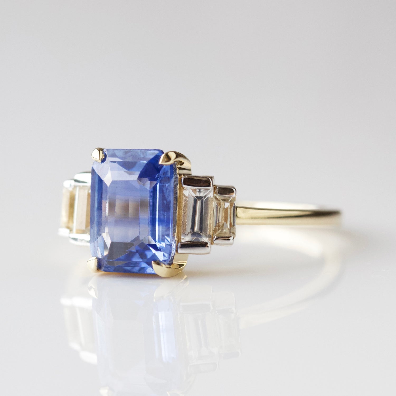 Blue and White sapphire engagement ring in solid gold