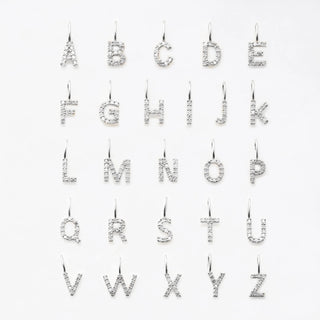 Diamond initial pendant in white Gold