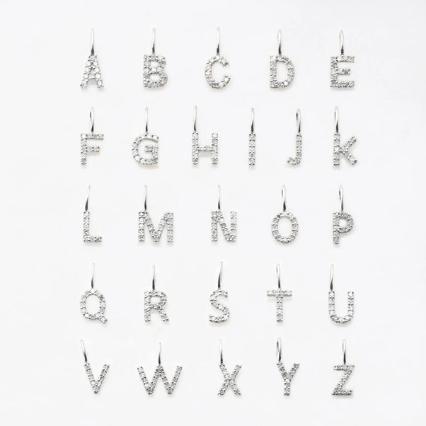 Diamond initial pendant in white Gold