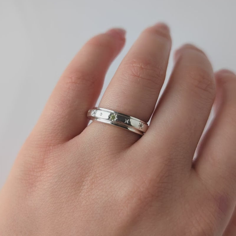 diamond and peridot spinning ring in silver