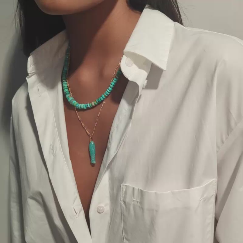 carved amazonite pendant