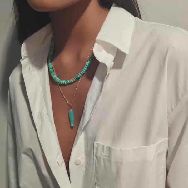 carved amazonite pendant