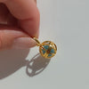 Gold manifestation pendant with interchangeable beads