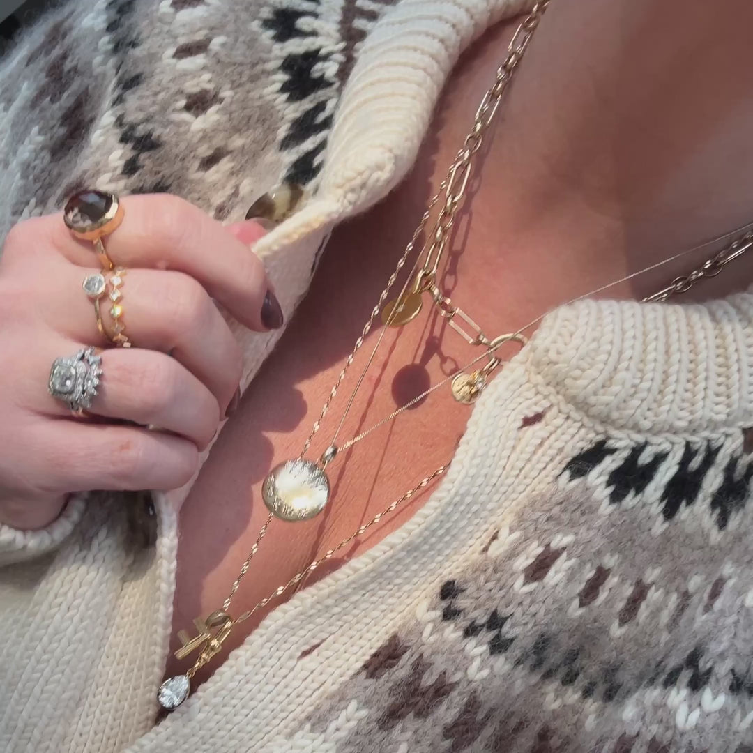 Gold shooting star locket