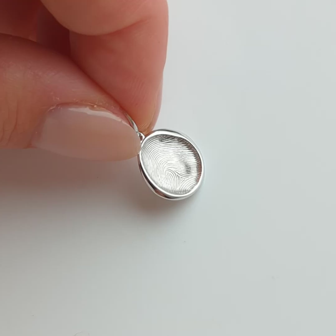 Carrie Elizabeth custom made fingerprint necklace in silver