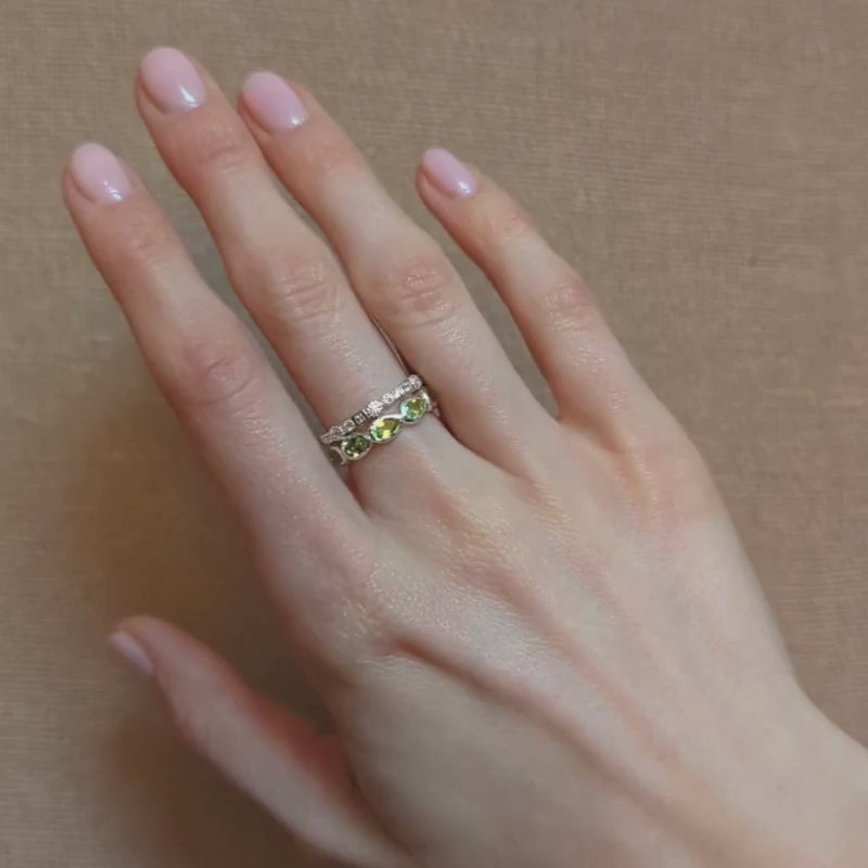 silver molten eternity peridot ring