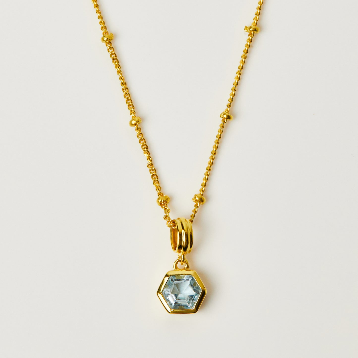 Carrie elizabeth blue topaz hexagon bobble chain necklace in gold vermeil