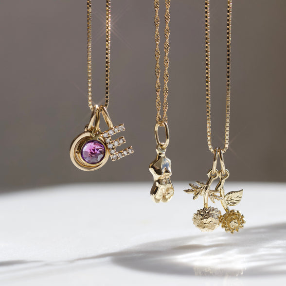 Carrie elizabeth birth flower charms 9k solid gold
