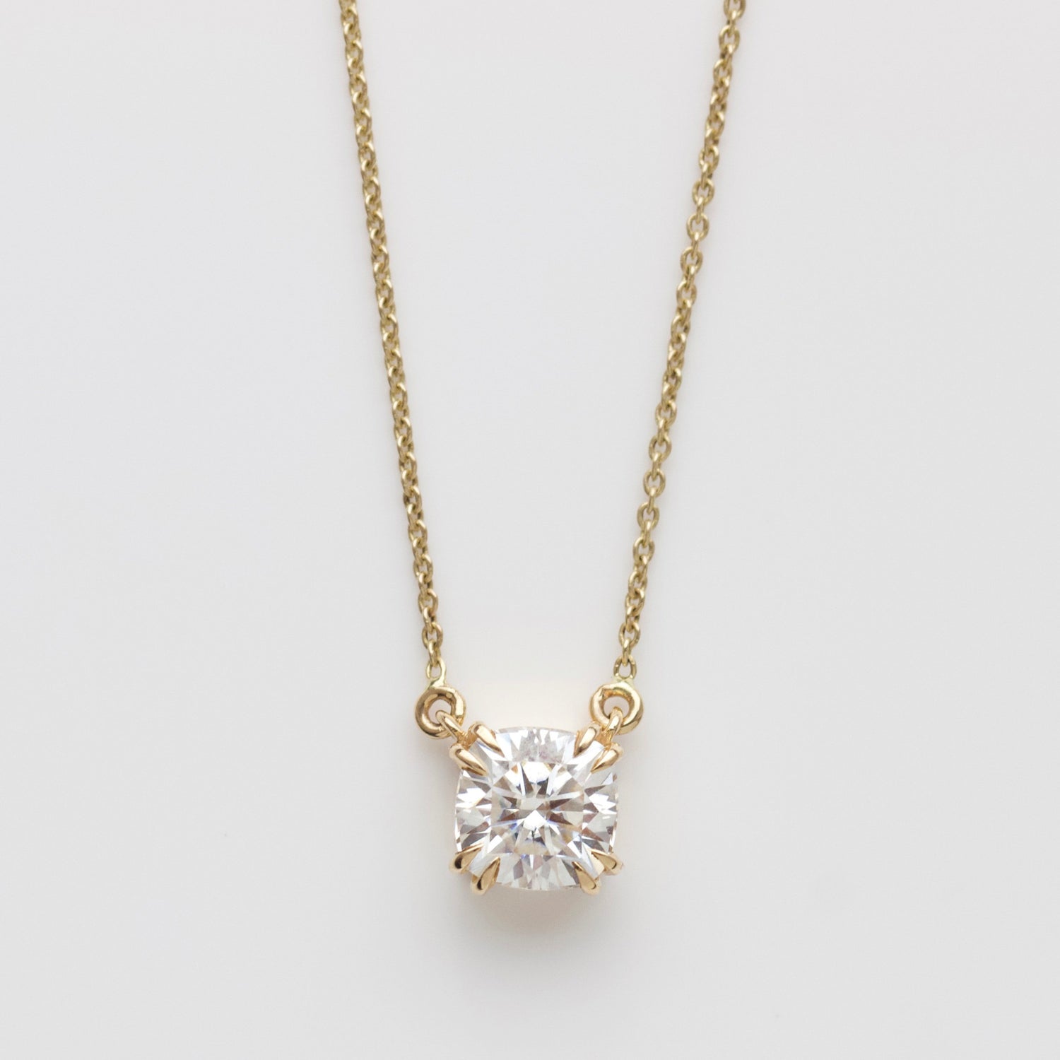 Carrie Elizabeth moissanite claw necklace in solid 9k gold