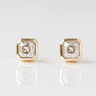 Carrie Elizabeth moissanite bezel set earrings in solid 9k gold