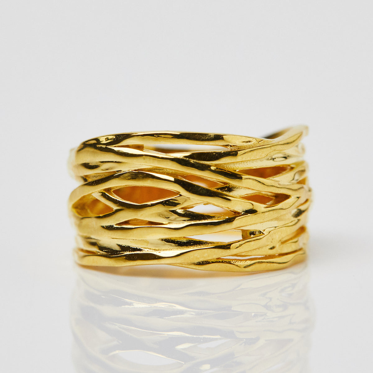 carrie elizabeth statement strand ring in gold vermeil