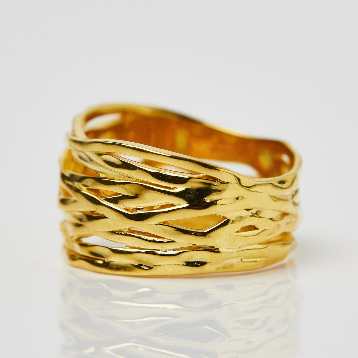 carrie elizabeth statement strand ring in gold vermeil