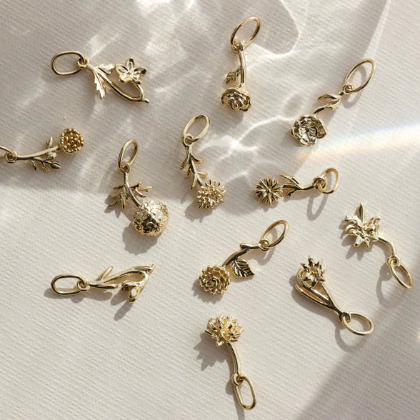 Carrie elizabeth birth flower charms 9k solid gold